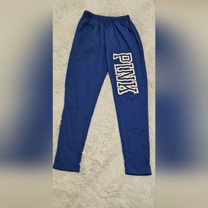 Junior girl's blue sweat pants. The logo "PINK" on the left leg the pants. Used.